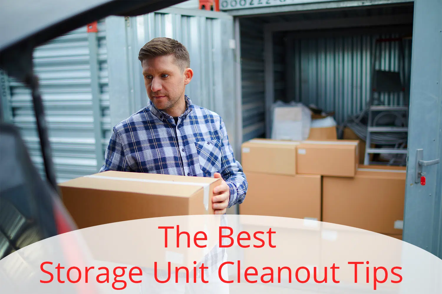 A storage unit cleanout in process - a storage unit with the door open with boxes inside.