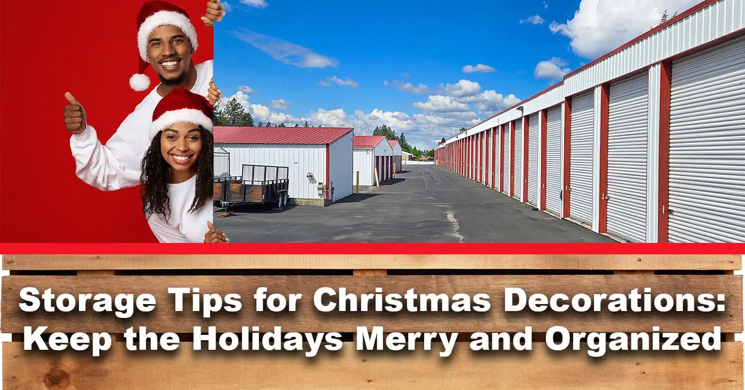 A couple wearing santa hats presenting the Bay Street Storage facility